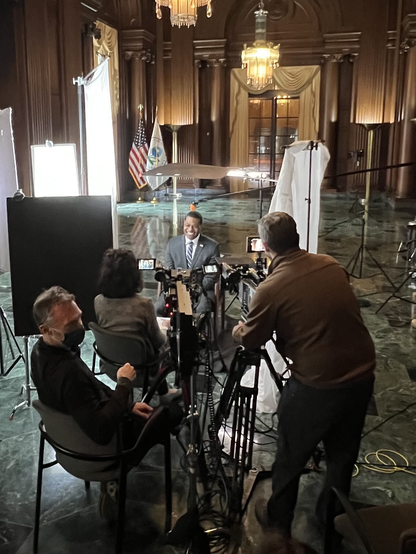 Interview setup inside an ornate government building for CBS News